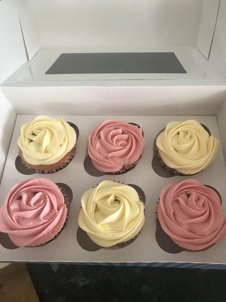 Elegant box of 6 premium cupcakes with swirled frosting and gold leaf